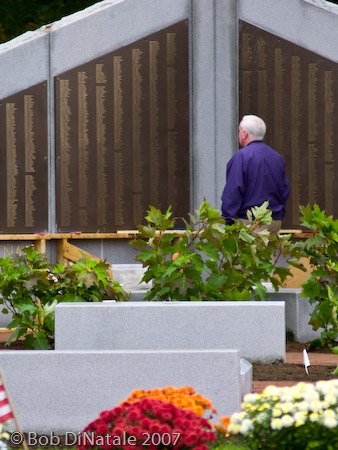 Mayor McGlynn and workers prepare for Memorial dedication