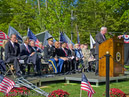 Mayor McGlynn’s Dedication Speech.  Pictured L – R:  Congressman Edward J. Markey, Senator John F. Kerry, Councillor Robert Maiocco, Councillor Stephanie Muccini Burke, Colonel John Hammond, Fr Joseph Foster, Rabbi Barham David, Temple President Charlotte Potak & Thomas Convery.